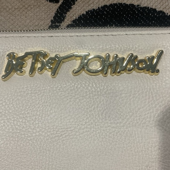 Betsey Johnson Handbags - Betsey Johnson Cream Clutch with Gold Accents